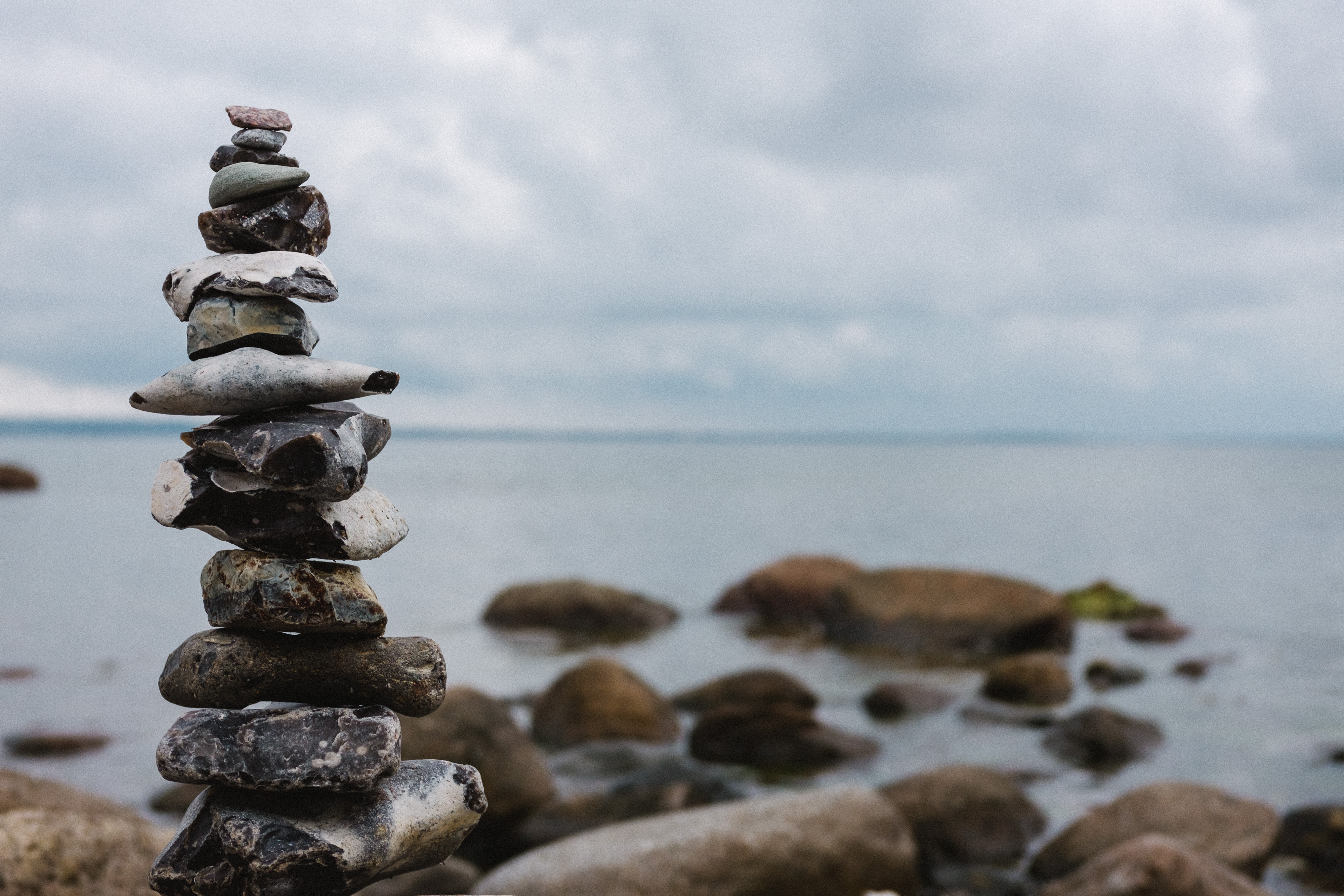 stones balanced on a beach